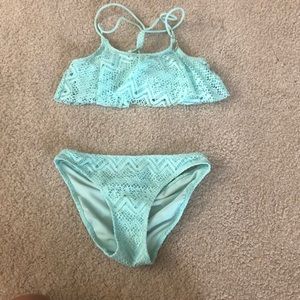 Cute Sea green swimming suit.  Good condition.
